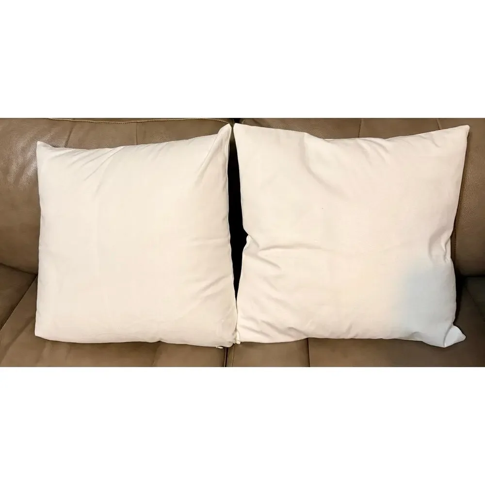 Two throw pillows featuring embroidered look floral pattern NEW